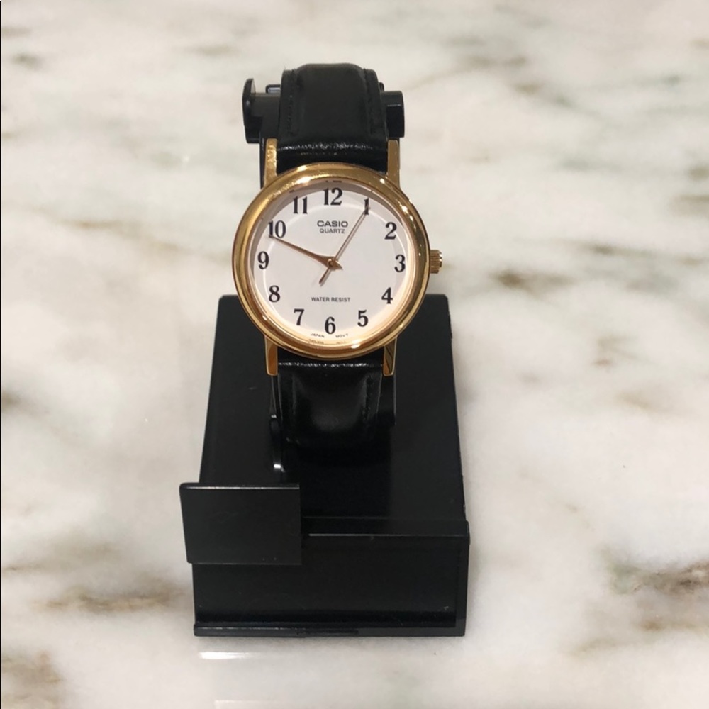 Vintage Casio watch with black leather strap